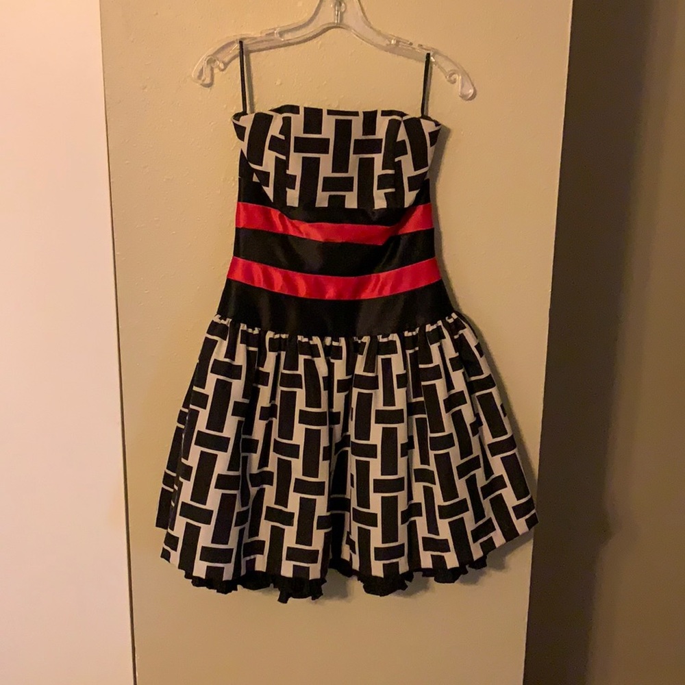 Black & White Geometric Strapless Dress with Red Accent